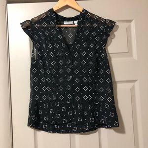 Black and white sheer blouse